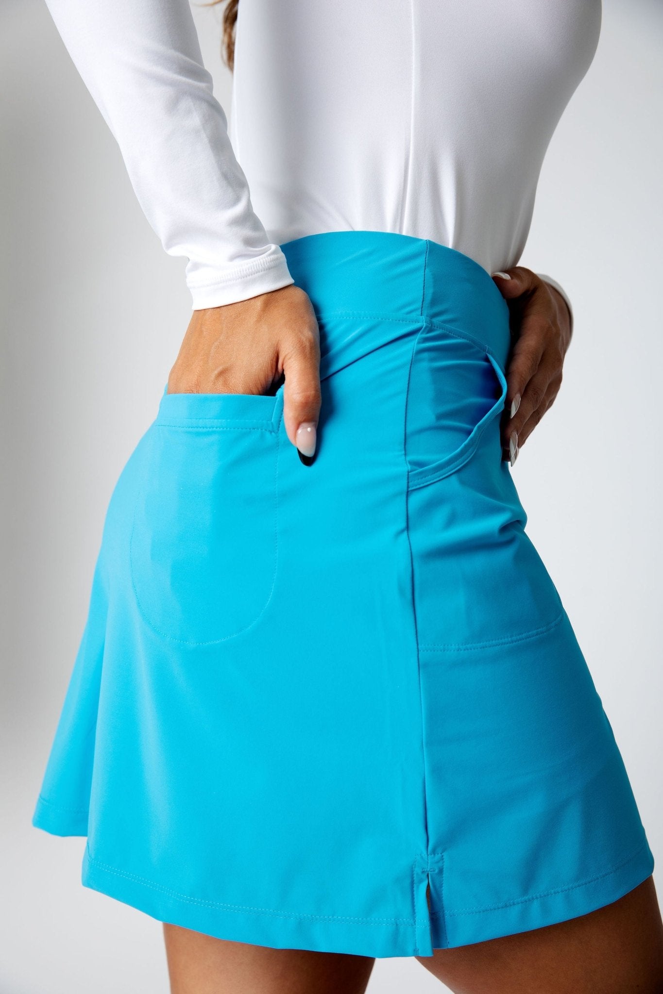 UV Staples 18" Turquoise Golf Skort by Sofibella, side view