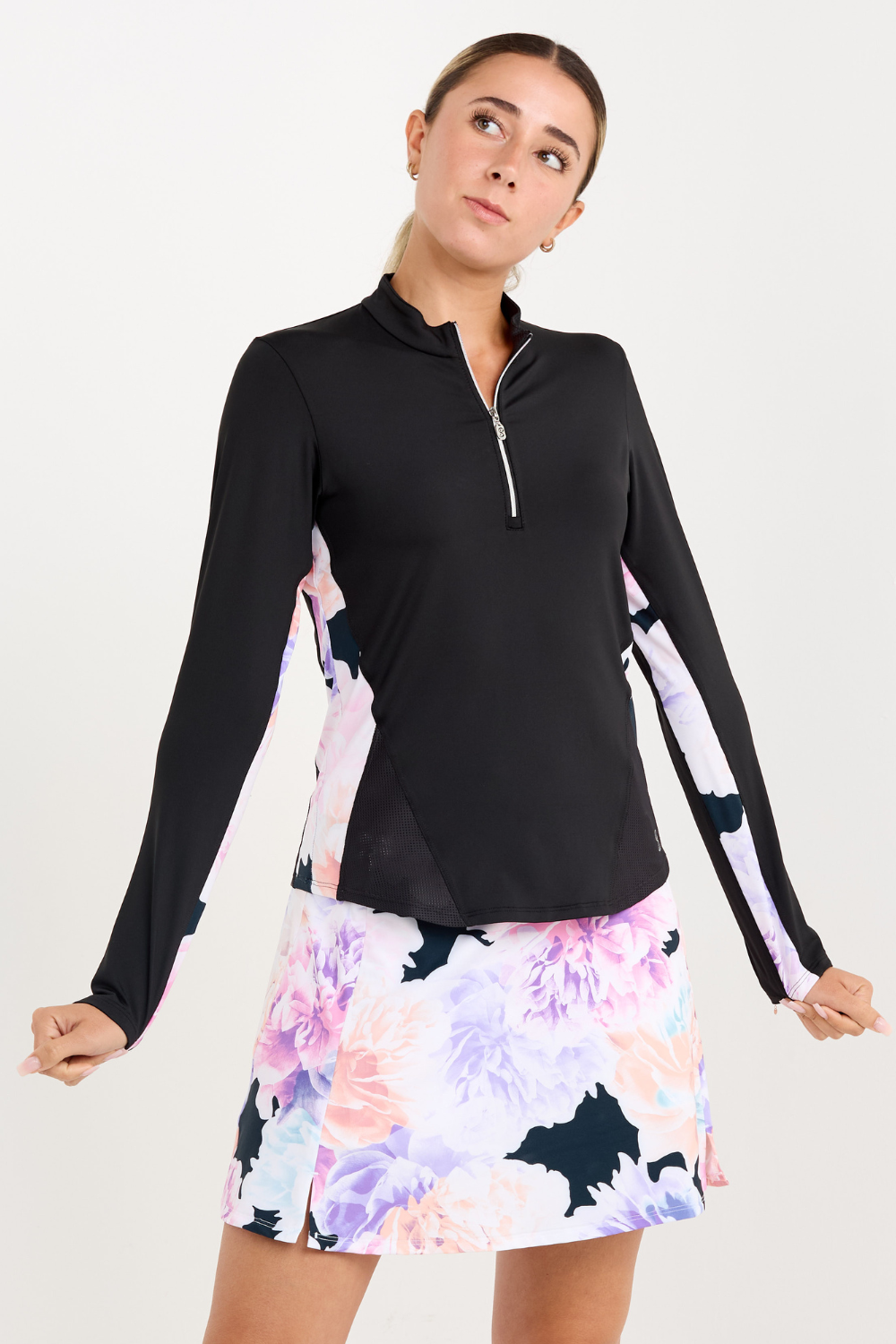 Women's Black Long Sleeve Zip Tennis Top with Peonies Inserts by Sofibella, front close up view
