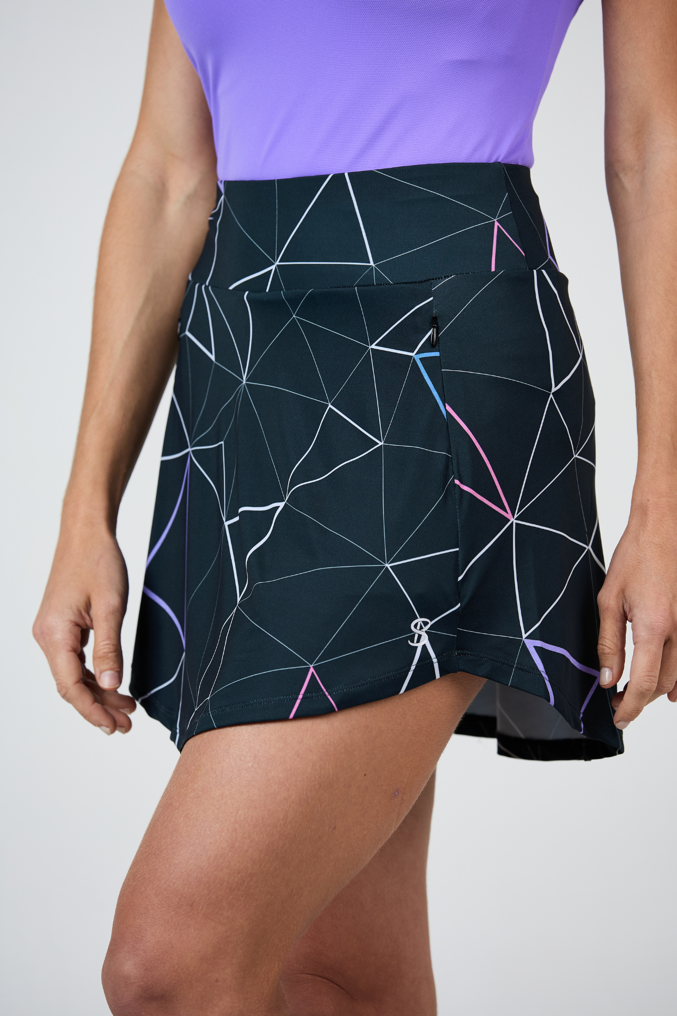 17" Triangle Net Print Golf Skort by Sofiibella, side view on model