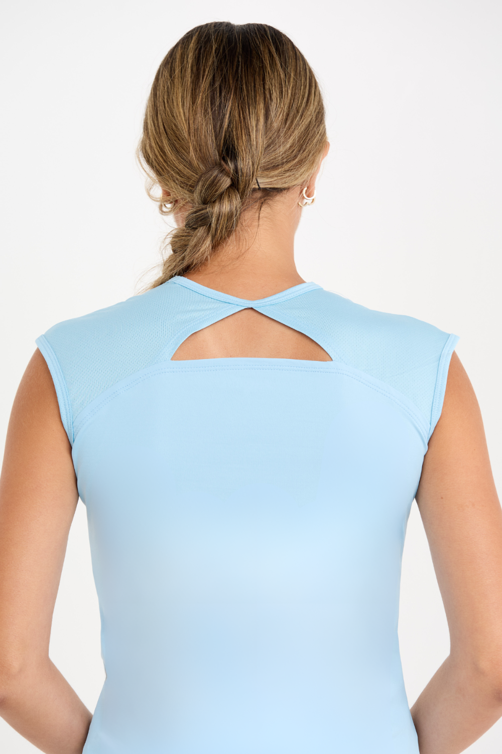 Women's Cloud Blue Cap Sleeve Tennis Top by Sofibella, back close up view on model