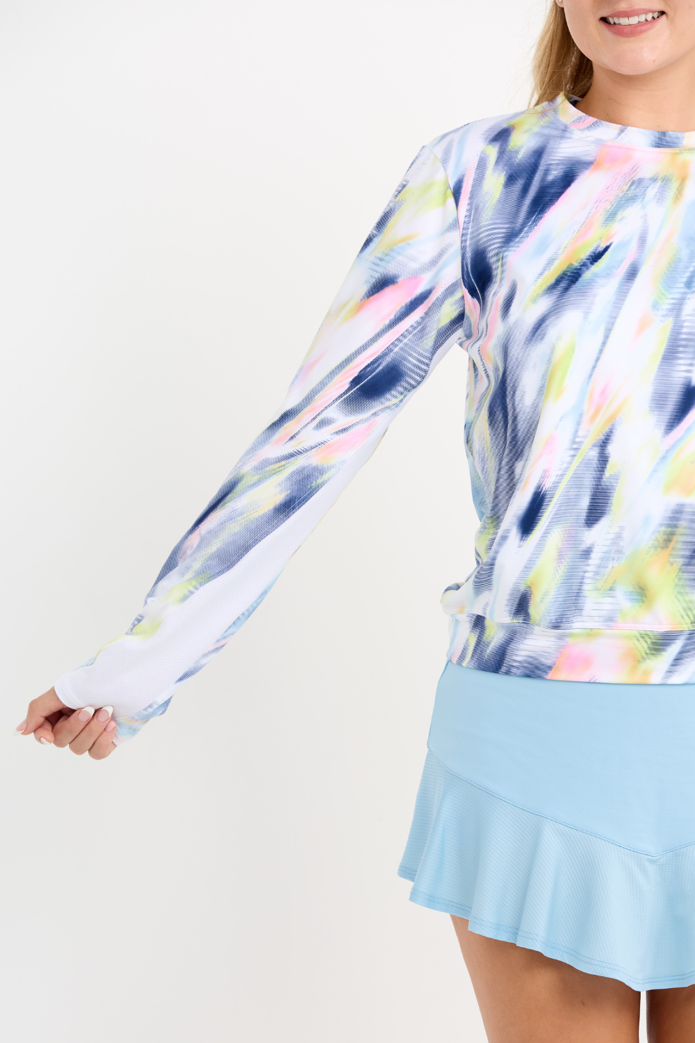 Aurora Sky Print Women's Tennis Pullover by Sofibella, mesh sleeve close up view on model