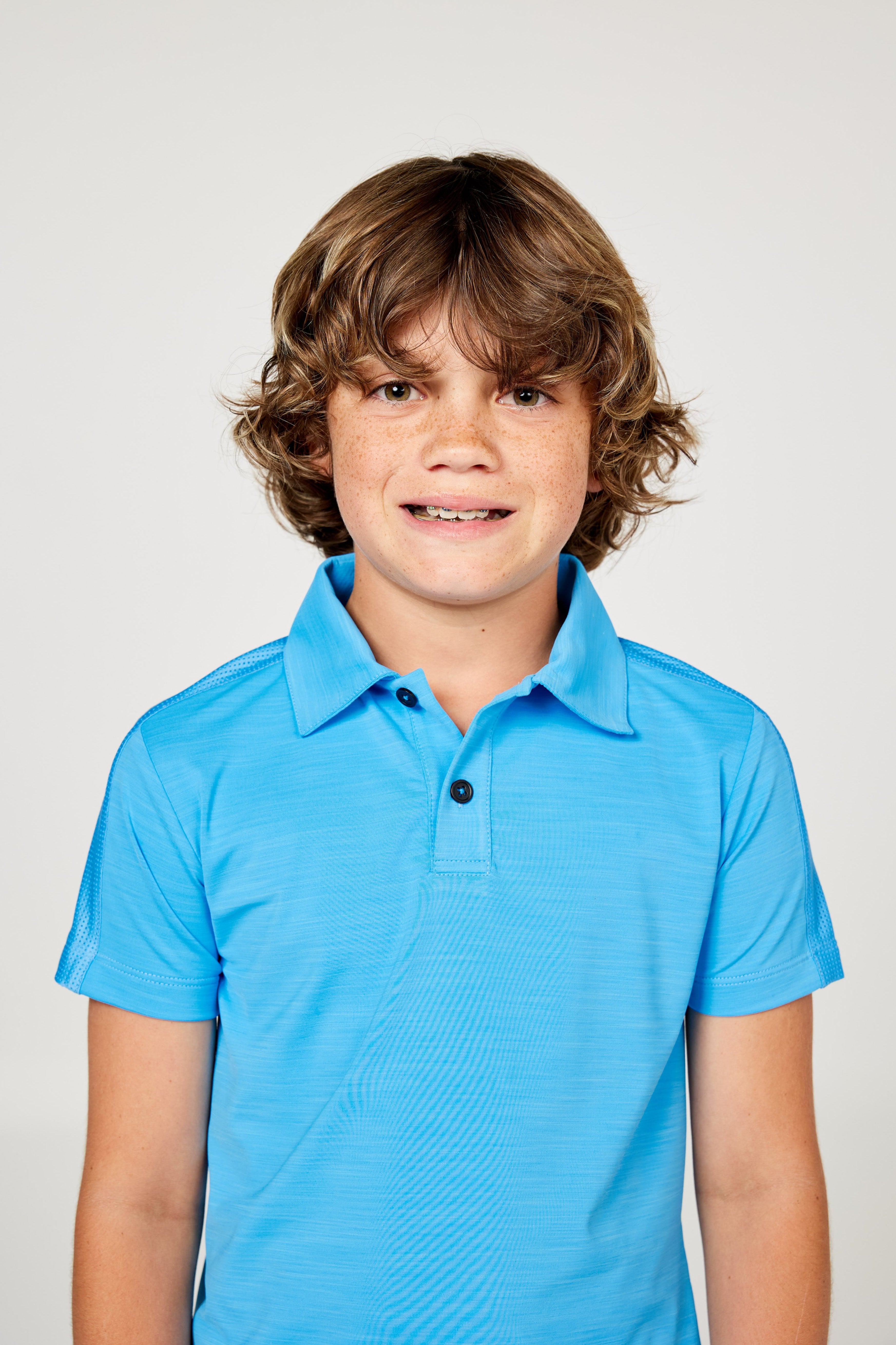 Perfect Volley Turquoise Boy's Short Sleeve Polo Tennis Top by Sofibella, front view