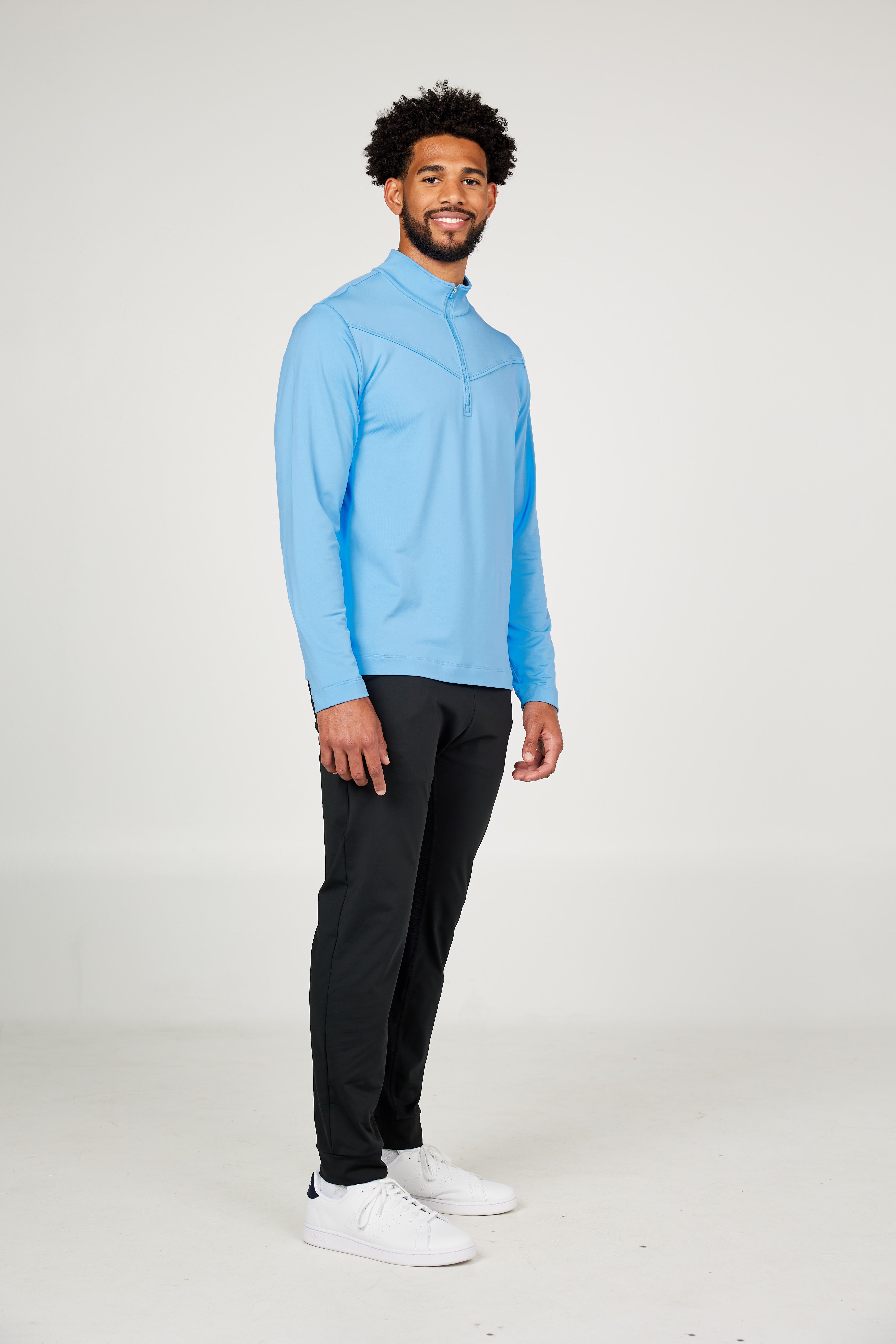 Men's Quarter Zip Neo Blue Tennis Long Sleeves Top by Sofibella, front view on model