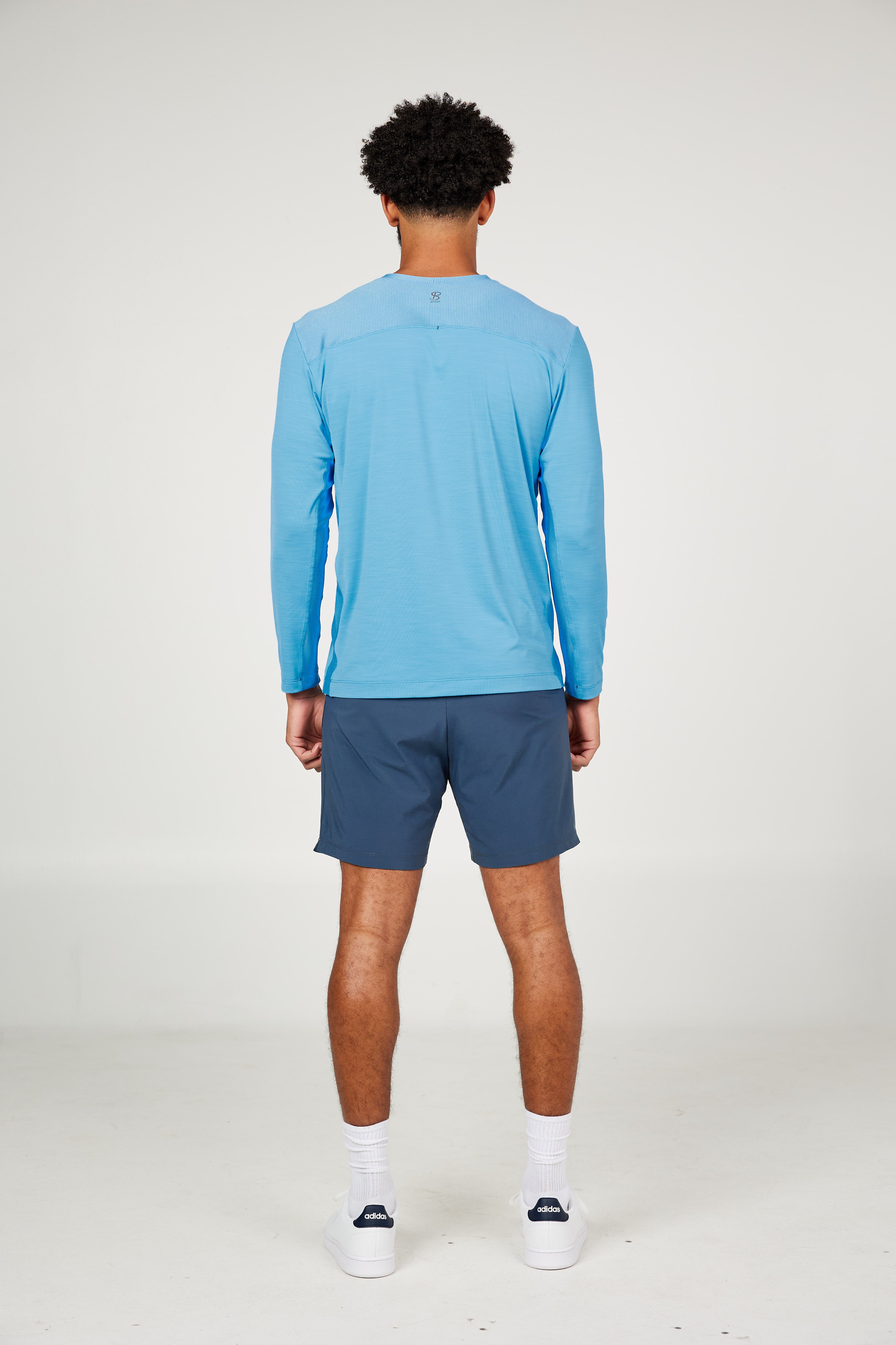 Perfect Volley Neo Blue Men's Long Sleeve Tennis Top by Sofibella, back view on model
