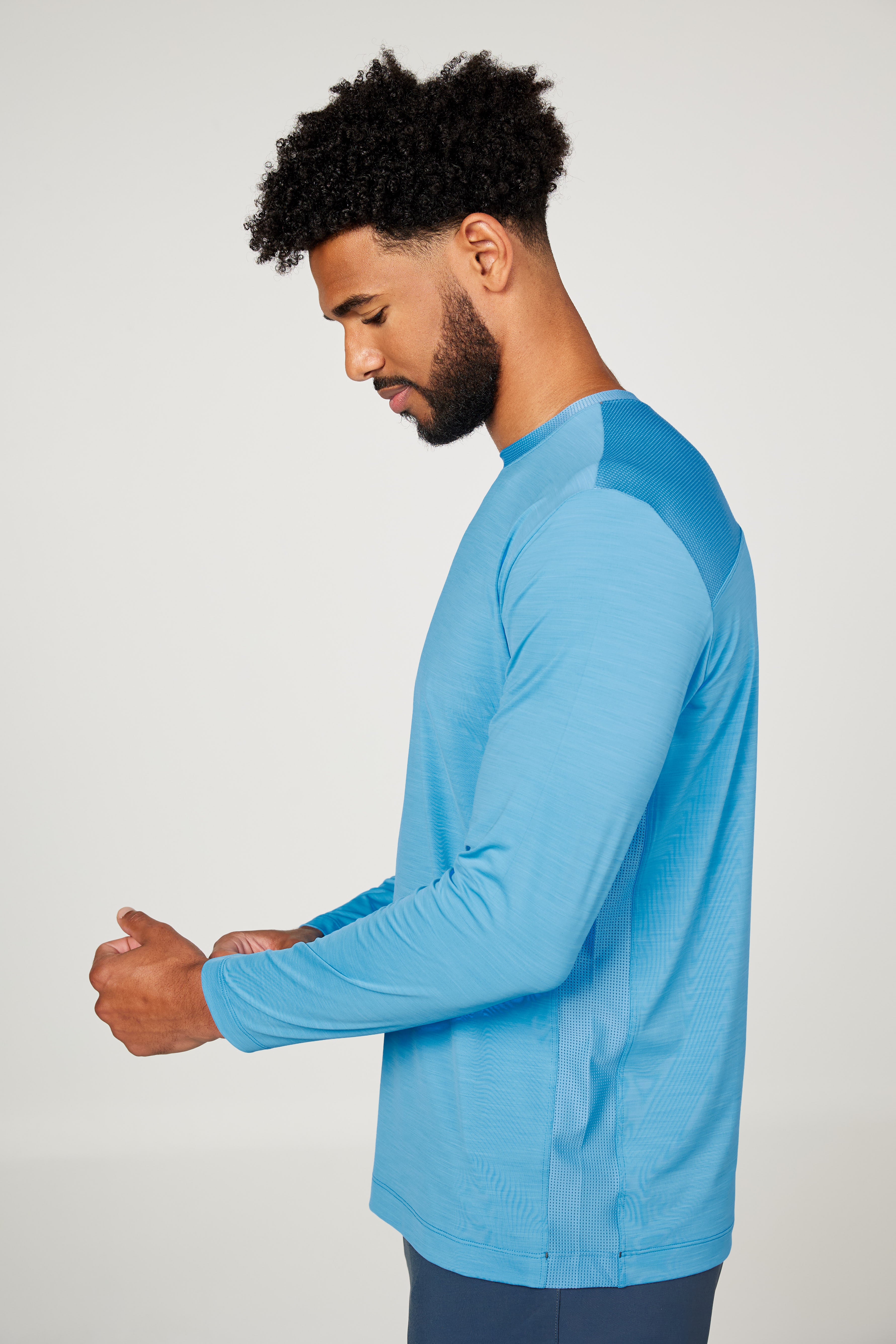 Perfect Volley Neo Blue Men's Long Sleeve Tennis Top by Sofibella, side view on model
