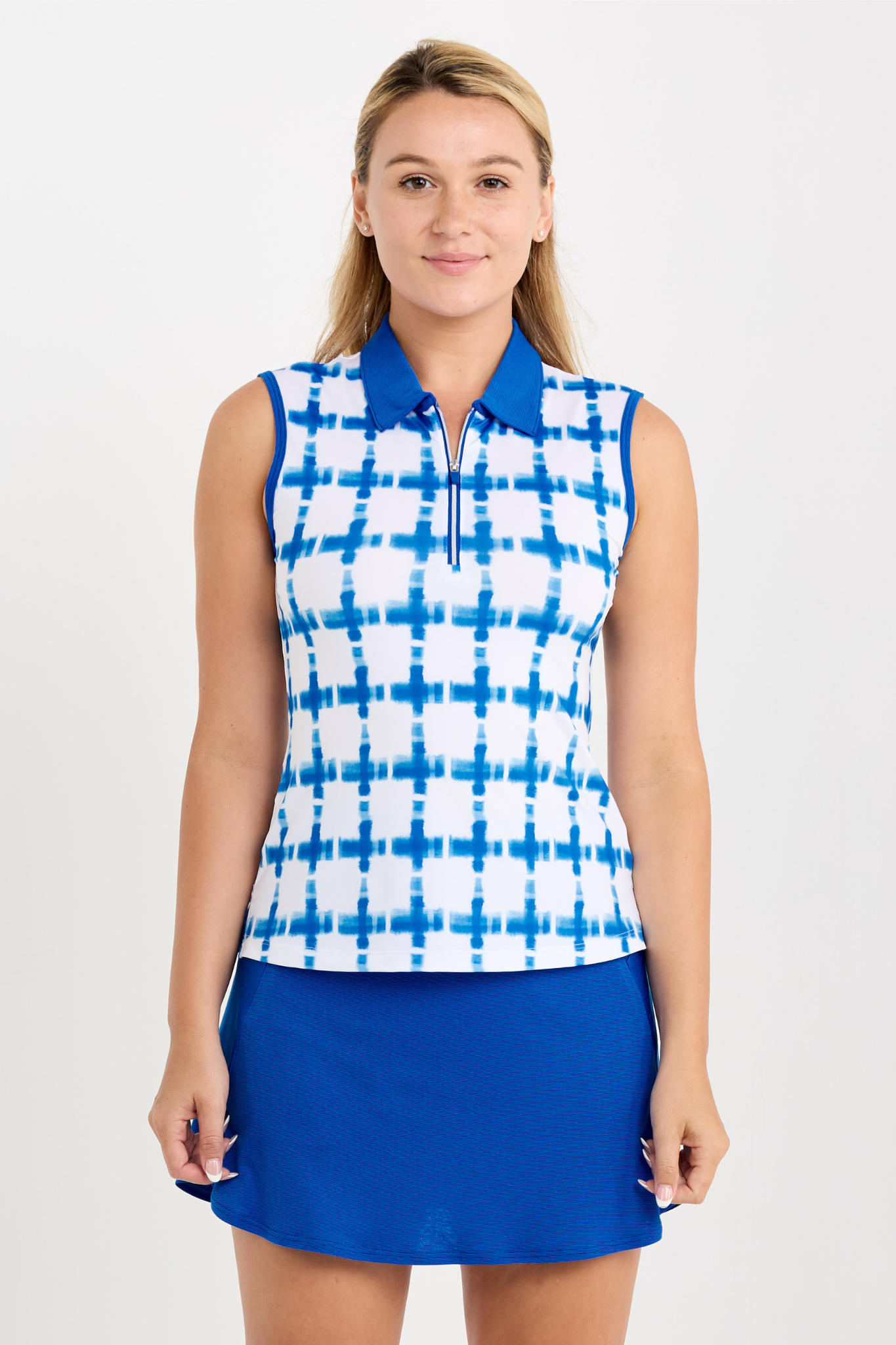 Miss Santorini Women's Sleeveless Polo Golf Top by Sofibella, front view on model