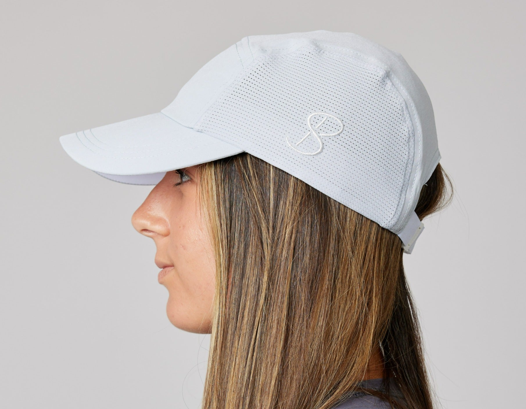 White Tennis Snap Cap with UV Protection by Sofibella, side view