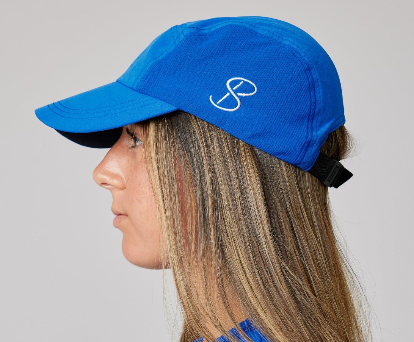 Royal Blue Tennis Snap Cap with UV Protection by Sofibella, side view