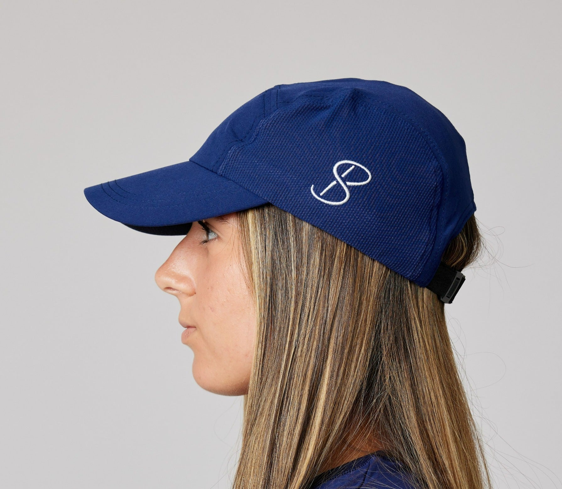Navy Tennis Snap Cap with UV Protection by Sofibella, side view
