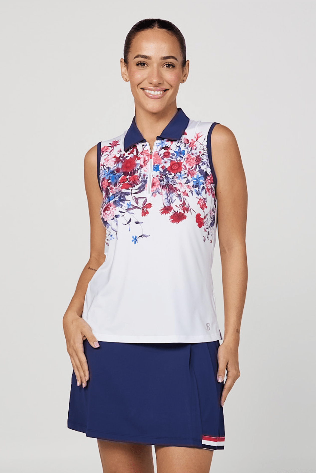 Women's Wild Flowers Golf Sleeveless Polo Top with Zipper by Sofibella, close up