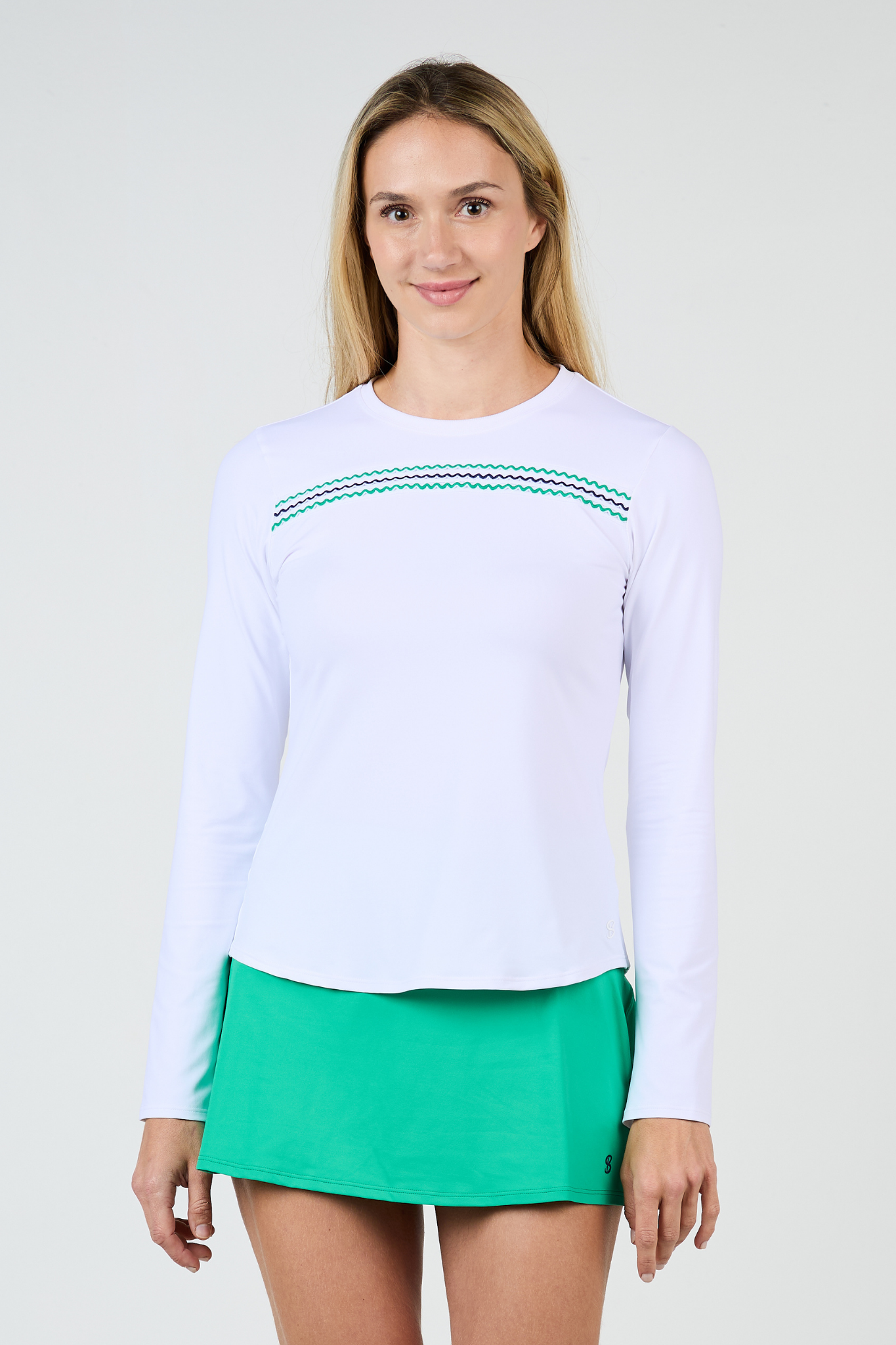 Green Spirit Women's Long Sleeve Tennis Top by Sofibella, front view on model