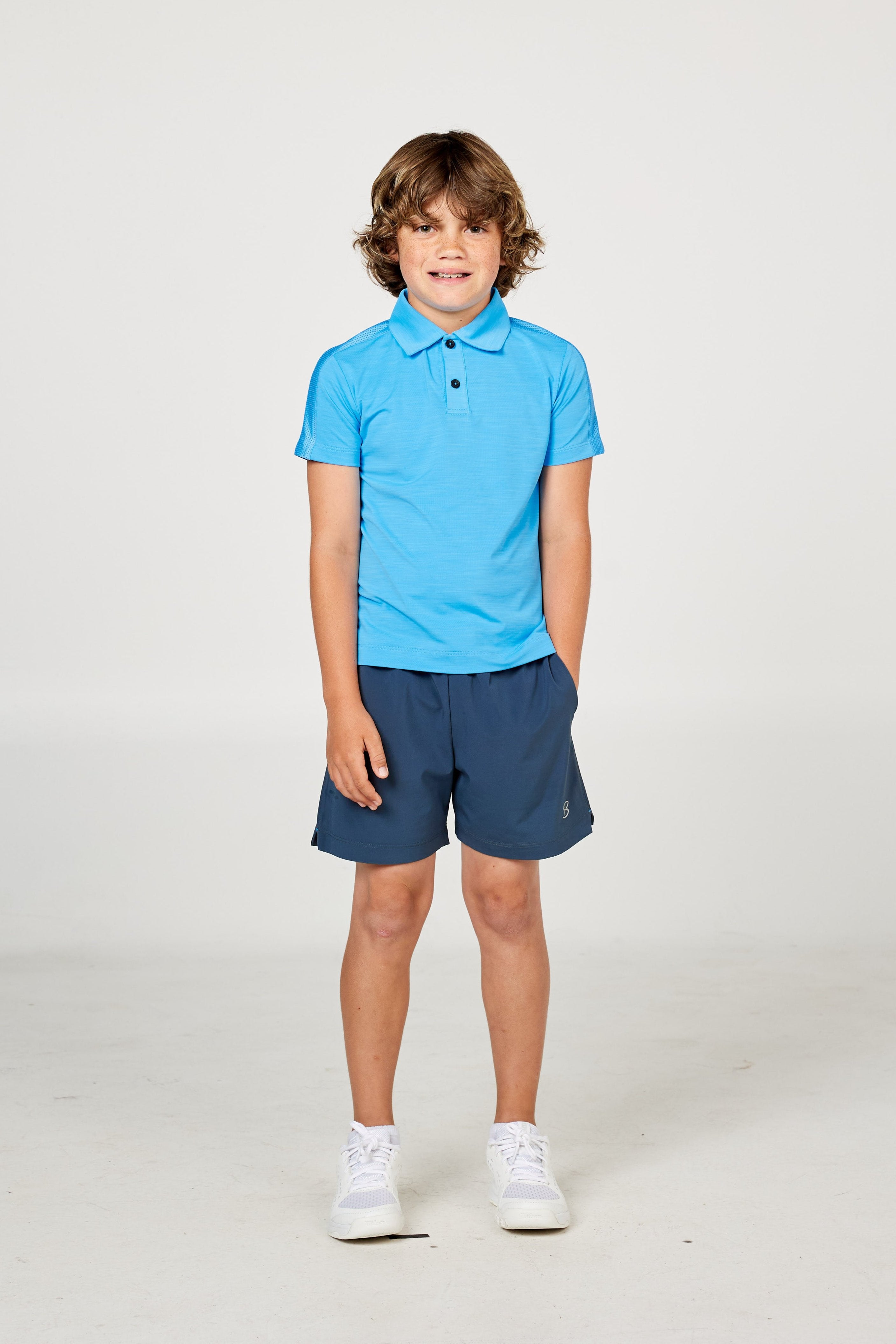 Perfect Volley Turquoise Boy's Short Sleeve Polo  Tennis Top by Sofibella, front view