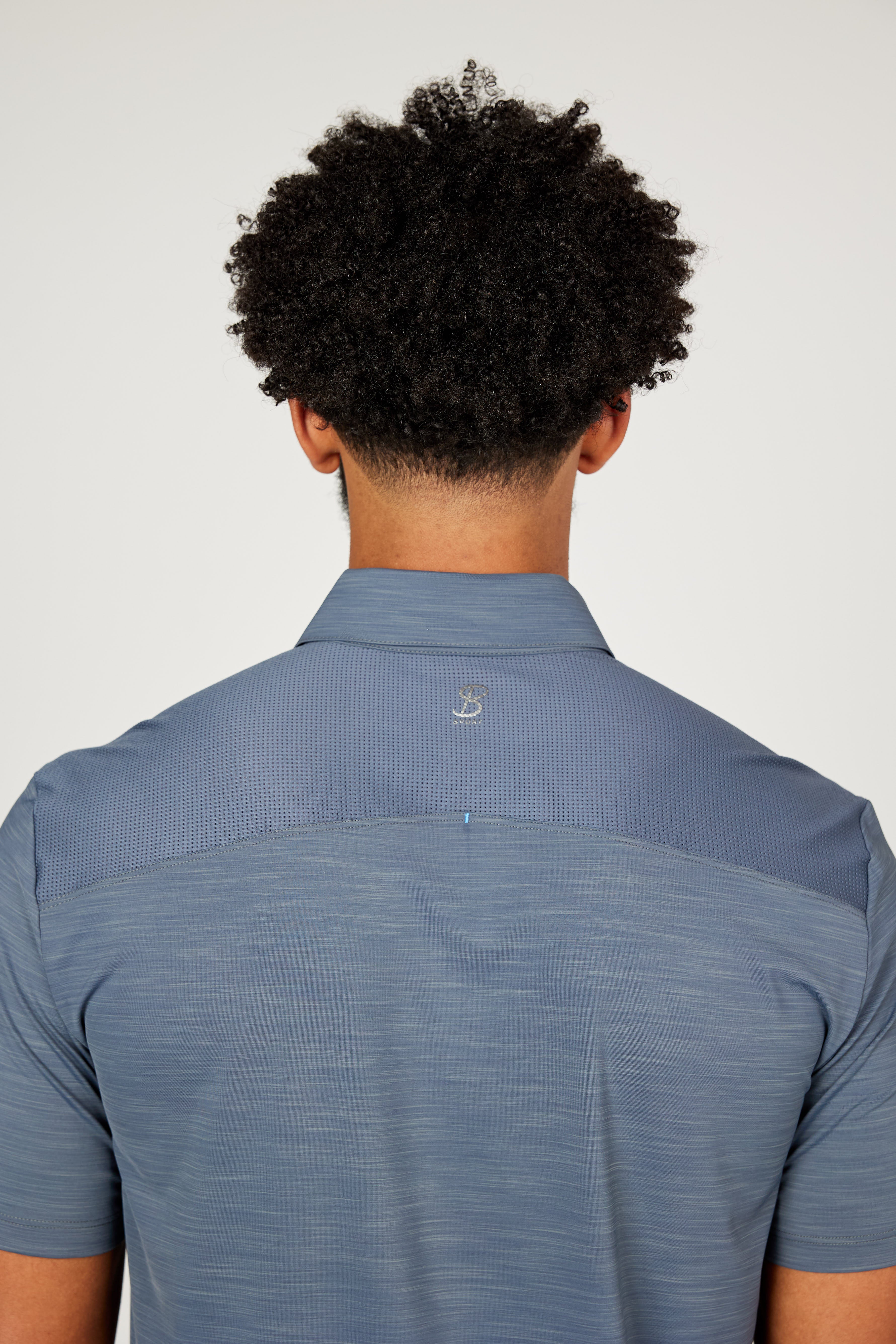 Men's Energy Short Sleeve Charcoal Polo Tennis Top by Sofibella, detail back view on model
