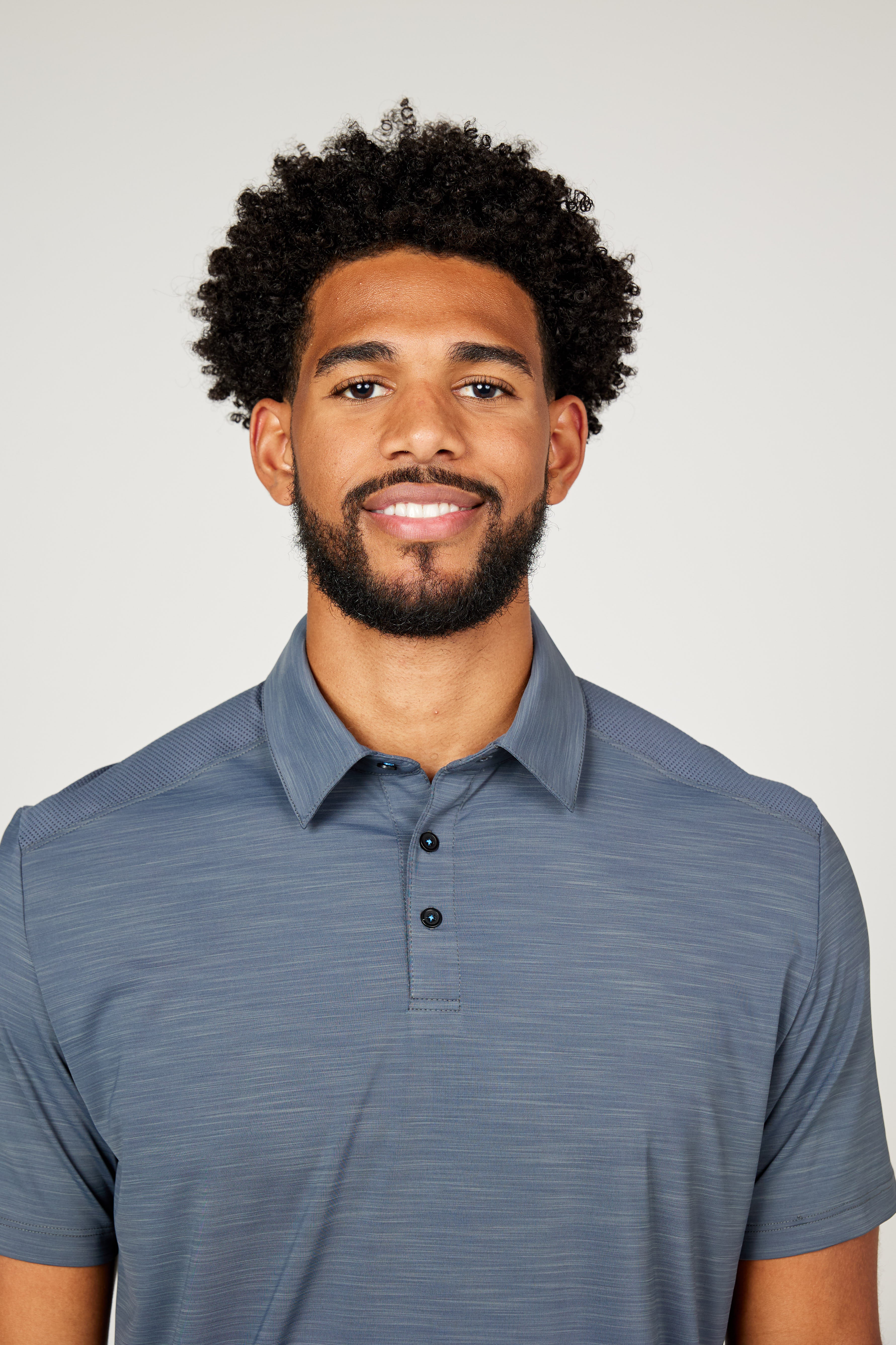 Men's Energy Short Sleeve Charcoal Polo Tennis Top by Sofibella, front close up view on model