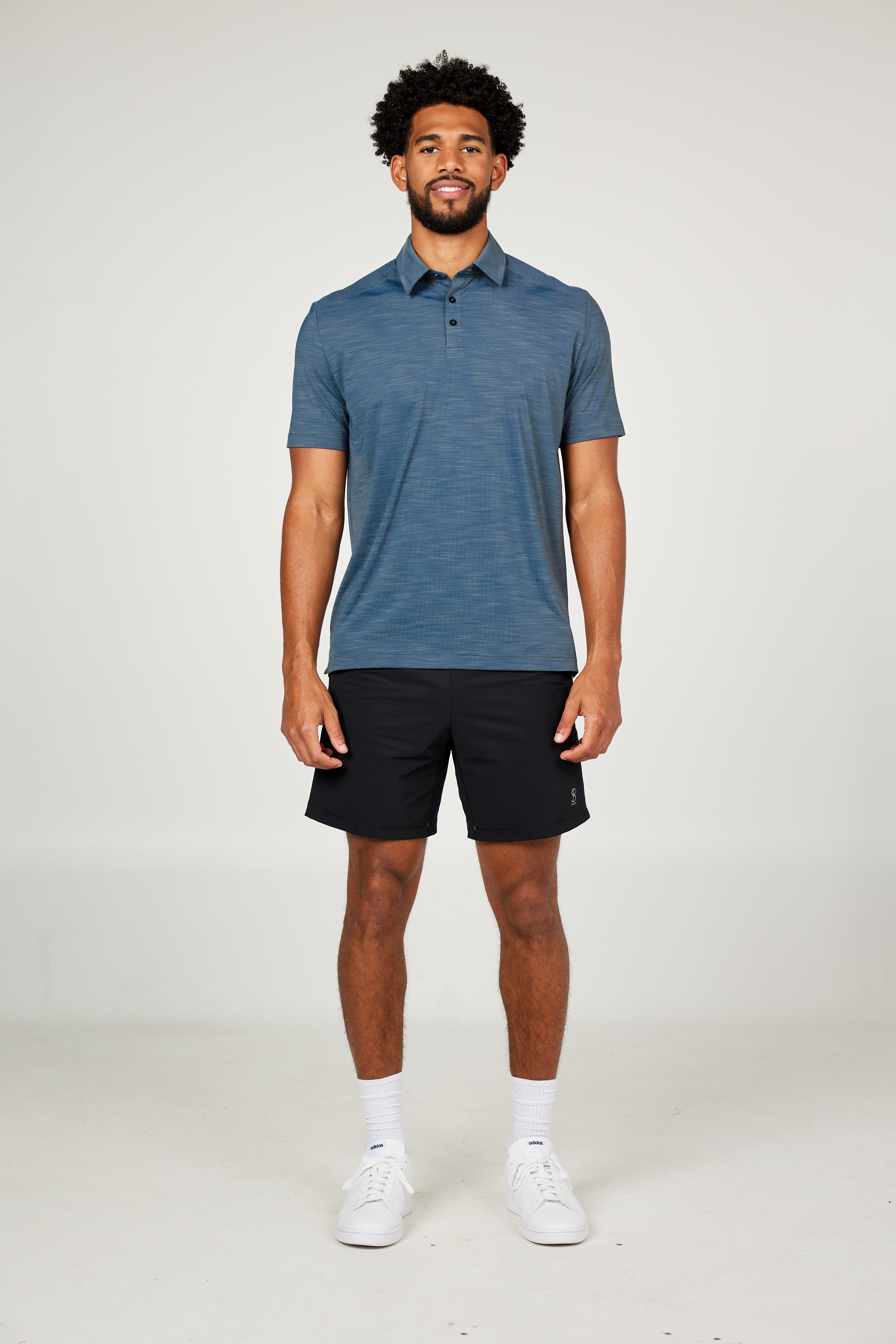 Men's Energy Short Sleeve Charcoal Polo Tennis Top by Sofibella, front view on model