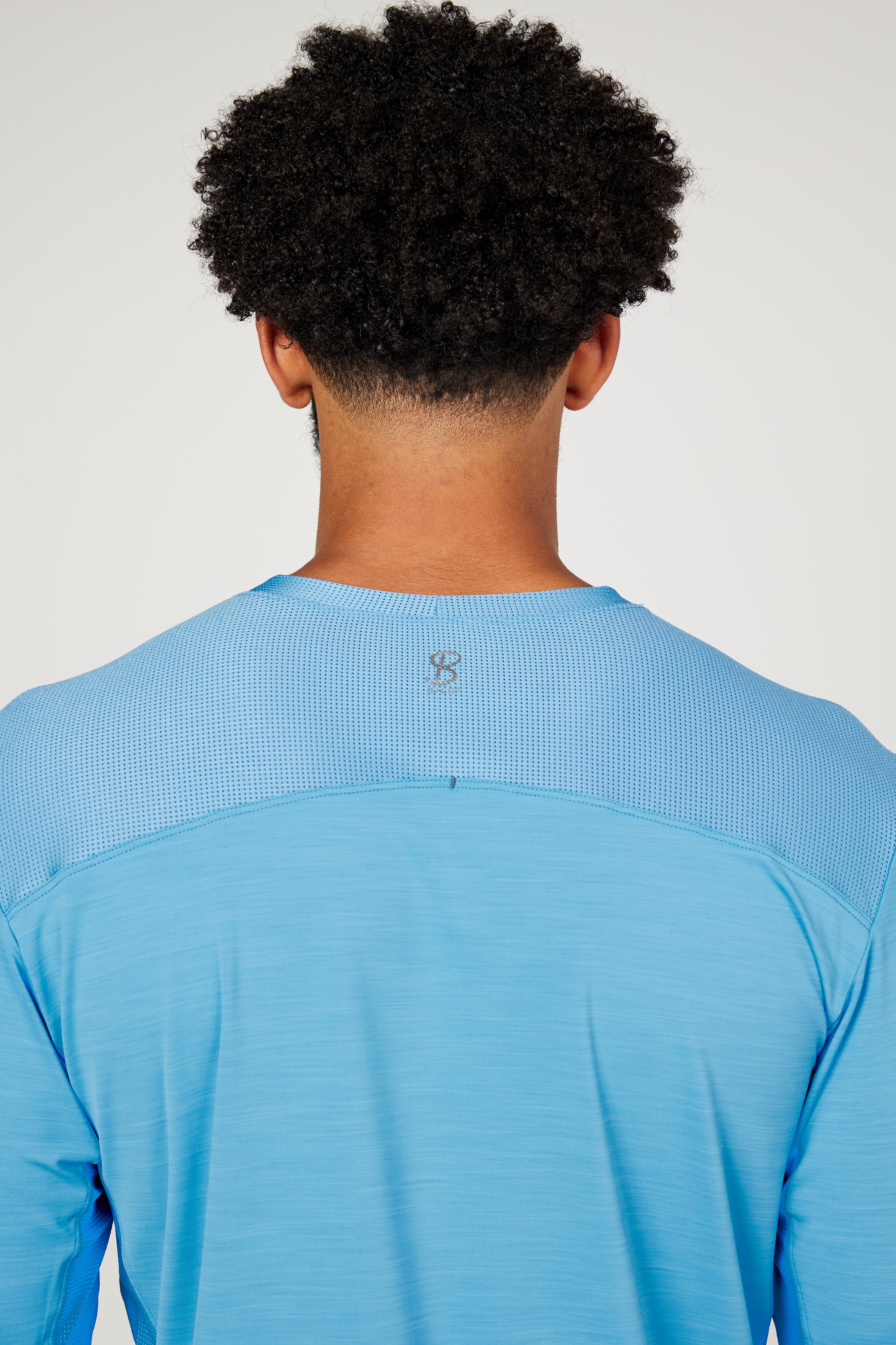 Perfect Volley Neo Blue Men's Long Sleeve Tennis Top by Sofibella, detail back view on model