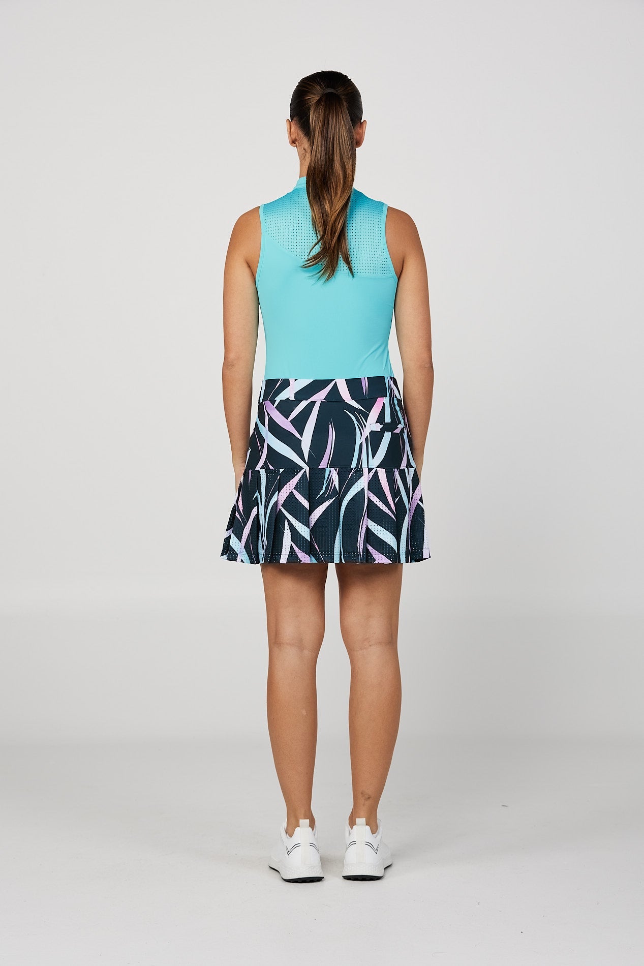 Women's Isla Bonita 16" Golf Pleated Skort by Sofibella, view of back